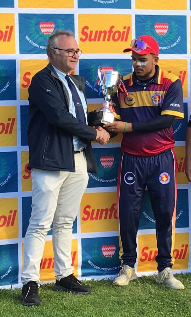Kuils River CC 1st XI captain, Darren Papier, receiving the AMA20 Trophy