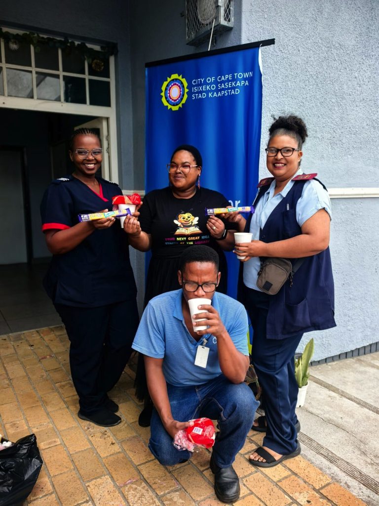 Sanelisiwe Dladla (student nurse, Kuils River clinic), Abongile Ndabazandile (adult librarian), Sr. Beverly Williams (nurse, Sarepta Clinic) and Sinovuyo Jack (front) were involved in the homeless outreach.