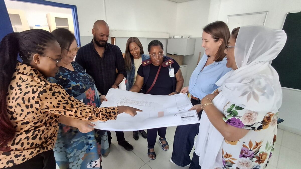 Mayco member for community services and health, Francine Higham and City officials look at the plans for the revamped Tafelsig Clinic.