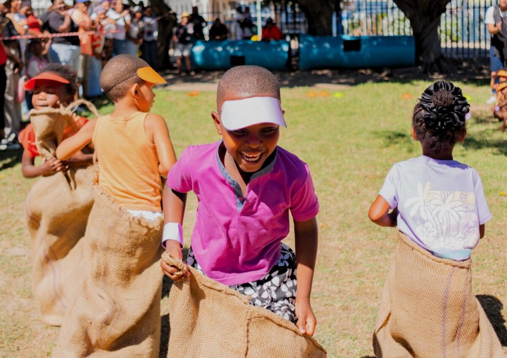 Kenny Nyamande (6) had fun in the sack race. Photo: Taniara O’Reilly