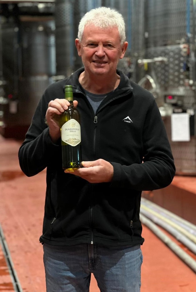 Kobus Gerber, white wine maker at Durbanville Hills, with the Durbanville Hills Sauvignonn Blanc 2025.
