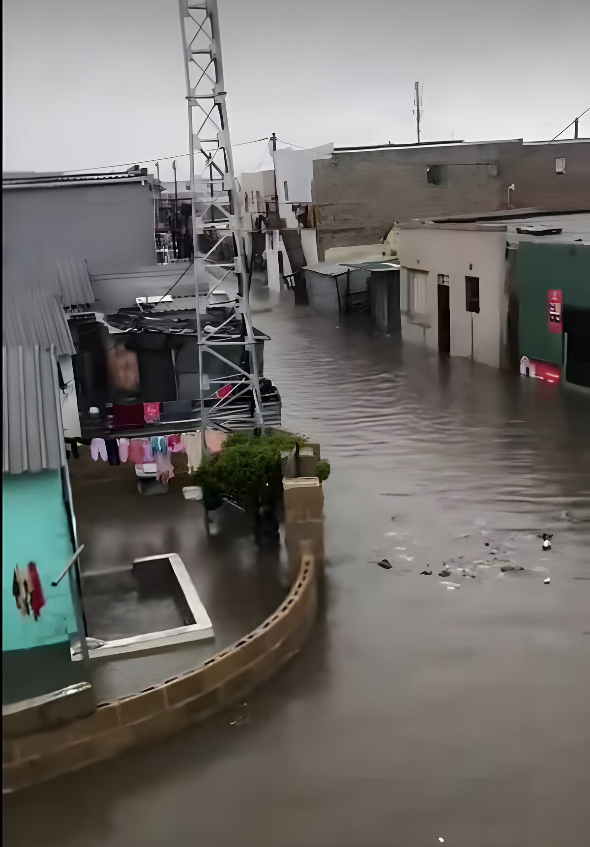 Floodwaters engulf homes and streets in Dunoon after relentless weekend rainfall.