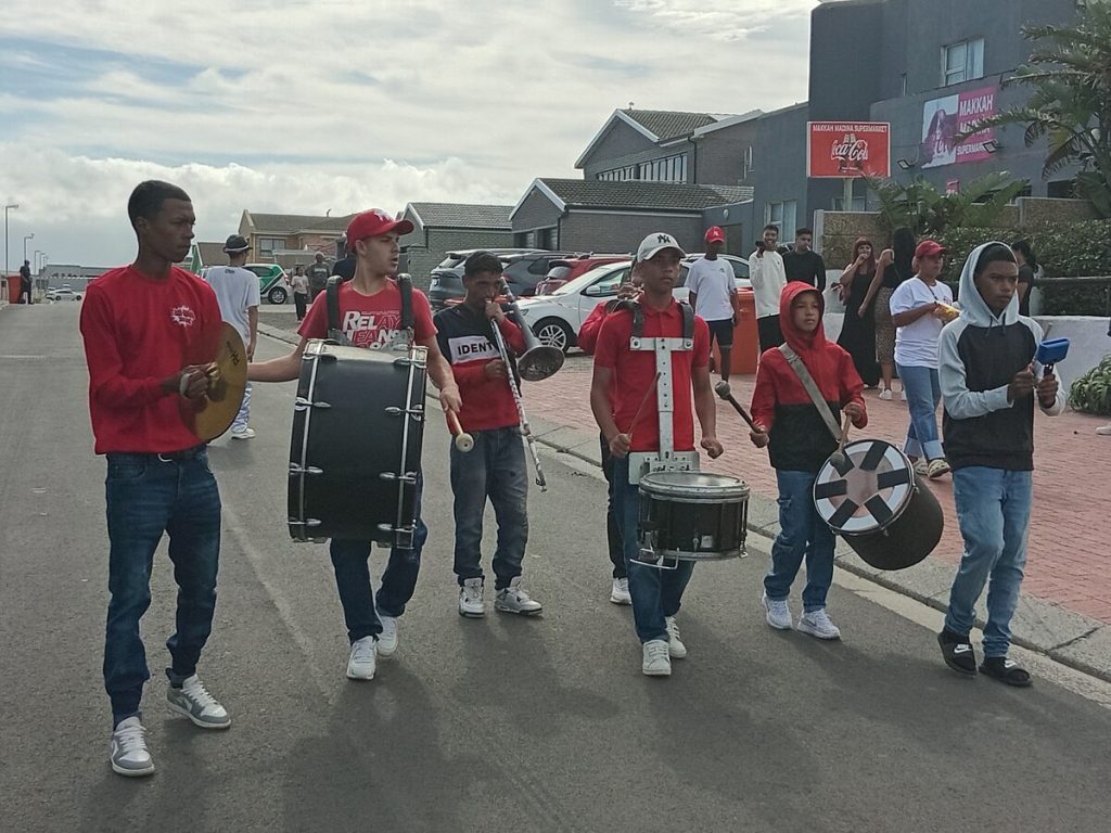 A marching band from Lentegeur walked down Seagull Street to attract patrons to the free carnival.