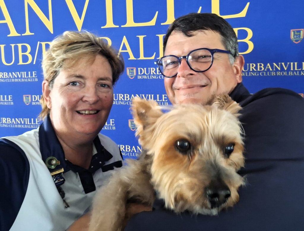 ebbie Phillips, with her husband and bowls coach, Eddie, and Koda. 