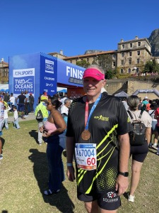 Step by step: 60-year-old’s running dream gifts school shoes to 2 800 kids
