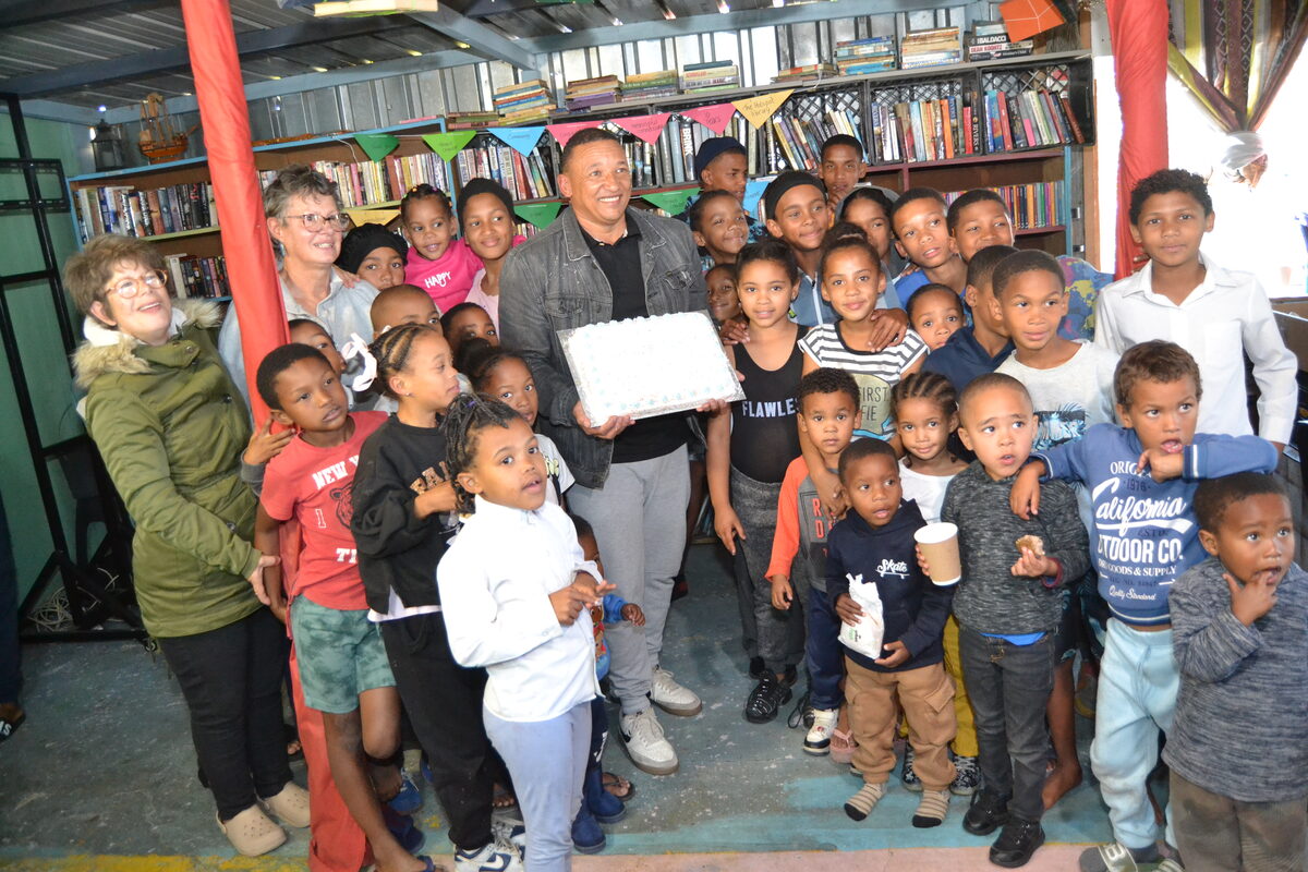 Mentor and children on the day of the celebration.