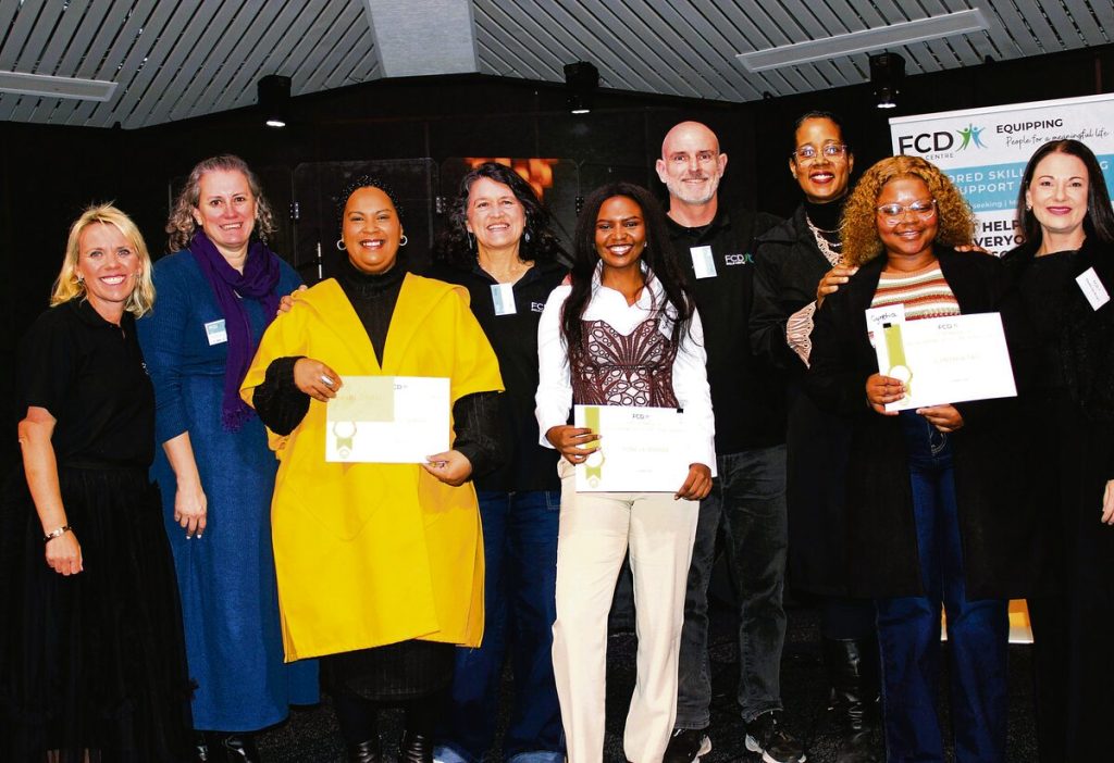 The Entrepreneur Awards of the Year went to (front from left) Nuraan Samaai (winner), Yonela Mpama and Cynthia Tati (runners up). At the back are Jane Gelderman (chief executive officer: FCD Skills Centre) wit the trainers and facilitators.