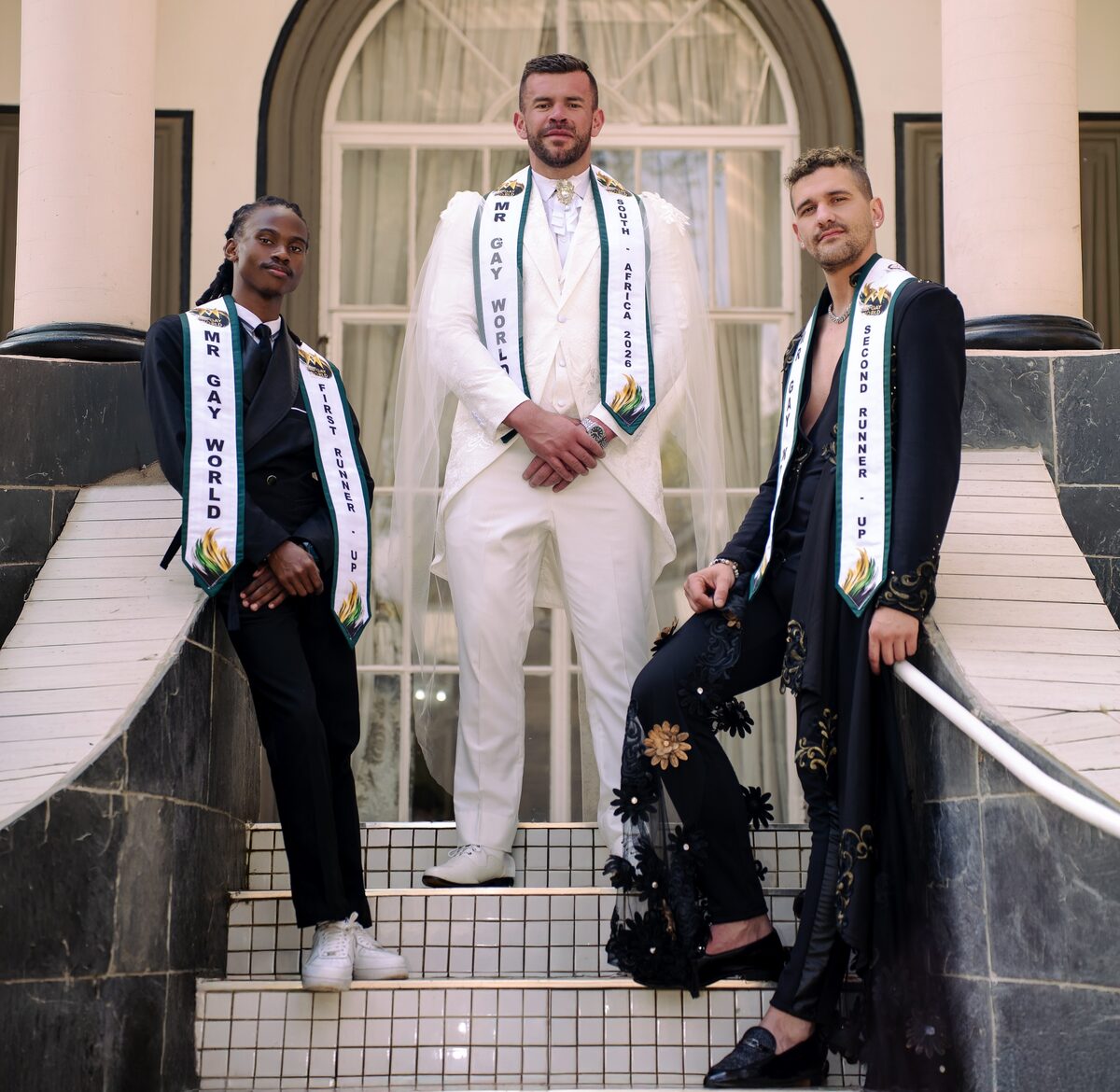 Mr Gay World South-Africa, Jacques Gous, first runner-up, Siyabonga Shabalala (left) and second runner-up, Gevaughn Brandt (right)