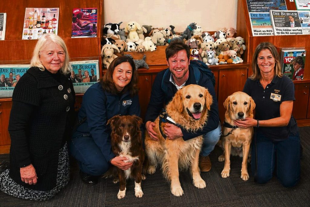 From left are Helen McClean with Charlie, Michiel Heyns with Lego and Sarah Bourhill with Dusti. Photo: Gail Leask