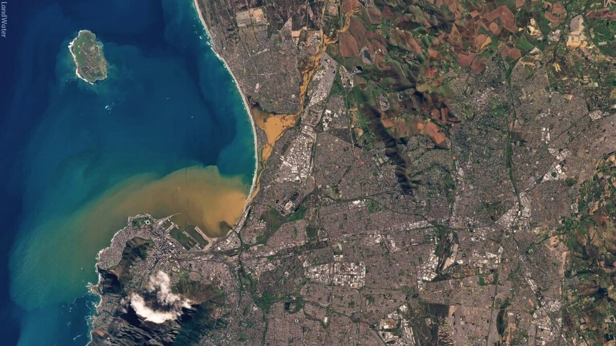 Satellite images show Black River carrying heavy litter loads into the ocean.