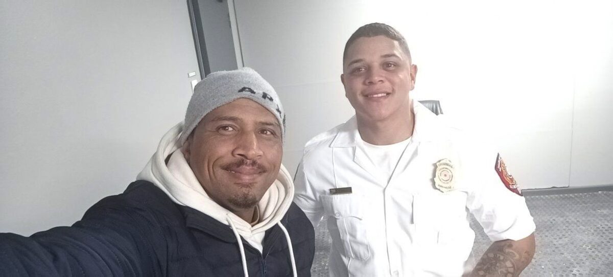 Nathan Gardiner with one of his heroes, Officer Craig Apollis.