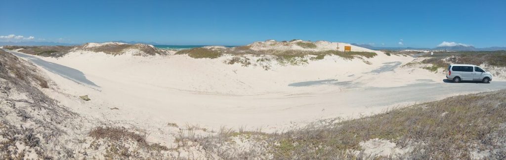 Large parts of the road have been reclaimed by the beach.