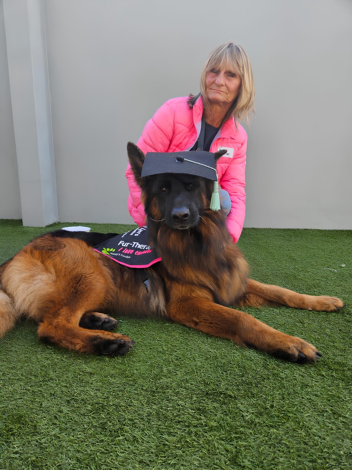 Cheryl-Lyn Potgieter with a therapy dog.
