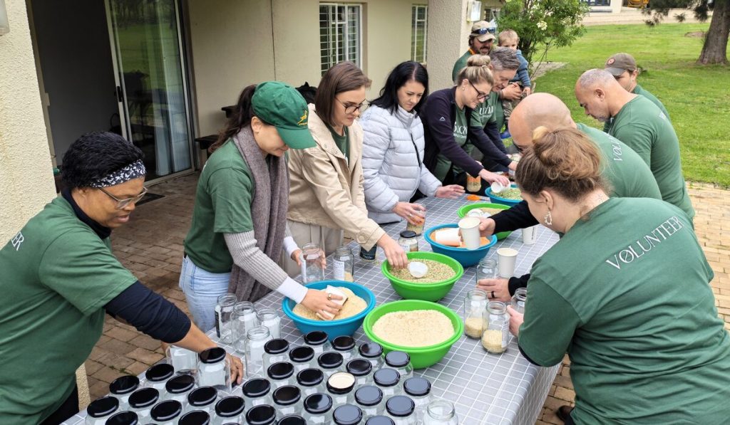 The team members of Buchu Collection are filling the Jars of Hope.