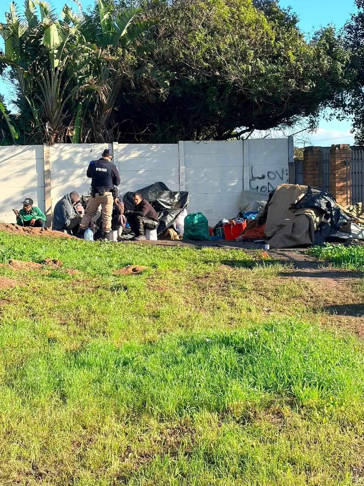 Law enforcement assists with relocation of illegal occupants in Ward 113.