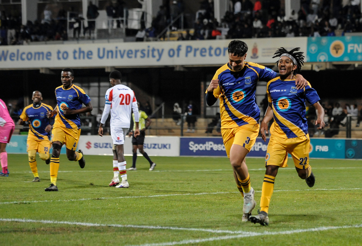UWC soccer players celebrate their 1-0 victory over UP-Tuks.