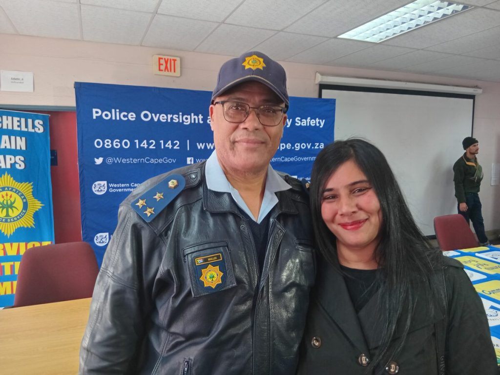 Mitchells Plain station commander, Brigadier Brian Muller, with Malickah Schaffers.