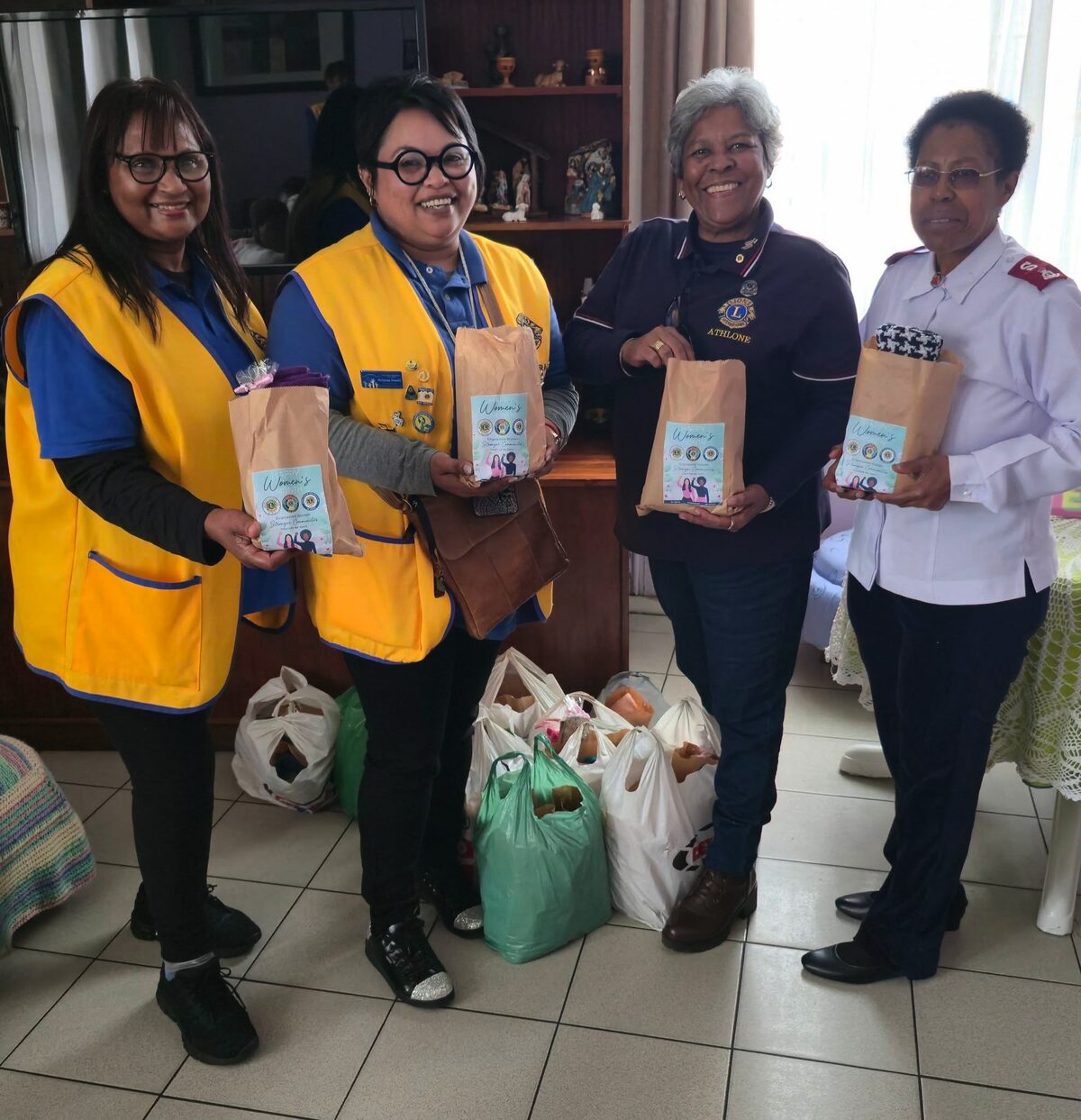 From left are Lions President Brenda Joshua (Cape of Good Hope), Lions President Hajiera Safiedien-Maloon (Mitchells Plain), Lions President Michelle Pinto (Athlone) and Pastor Madeline Phore (Salvation Army).