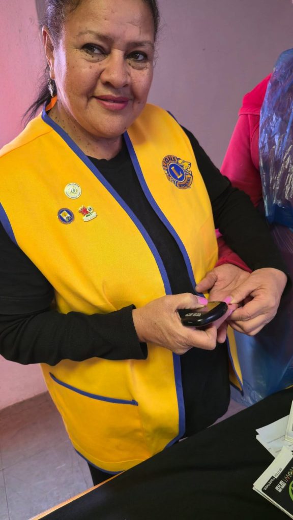 Lion Sharon Sampie does a blood sugar test.