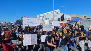 Protestors demand economic inclusion at Promenade Mall