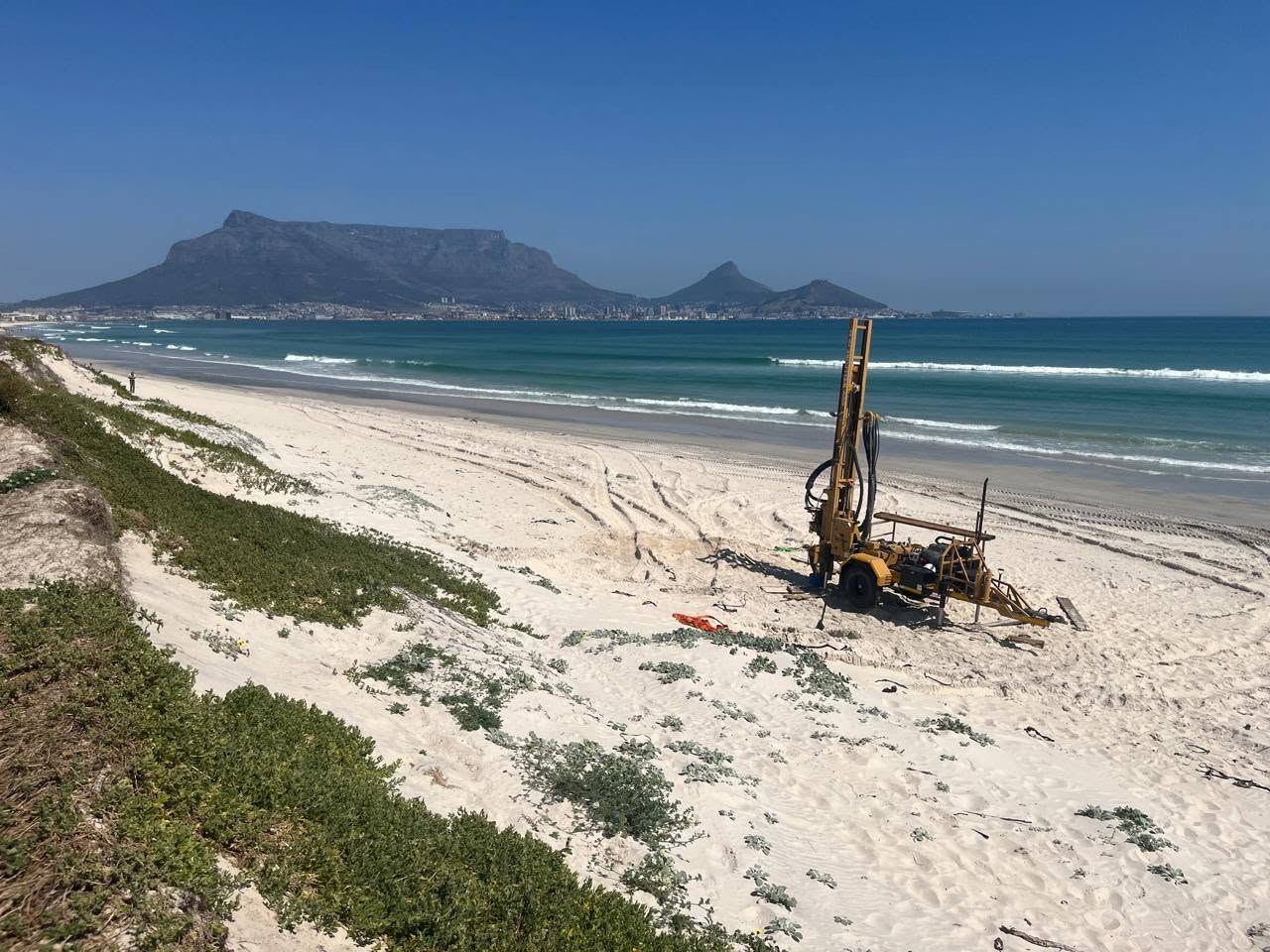 Drilling for beach wells