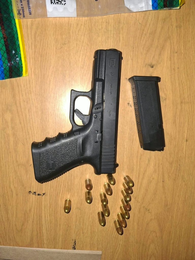 One of the guns and ammunition that police confiscated.