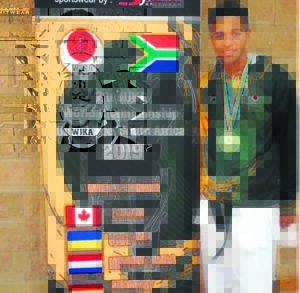 Lyall wins gold at karate champs