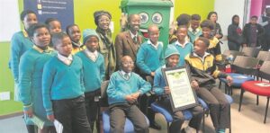Activist Khazimla Adam stands against illegal dumping