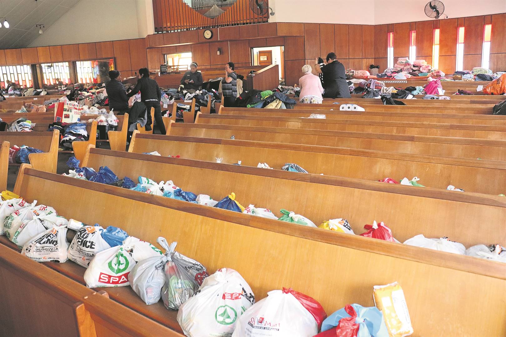 NG Kerk De Mist opened its doors to hundreds of people affected by the heavy rain, and with the help of donors has been able to give them clothing and meals.