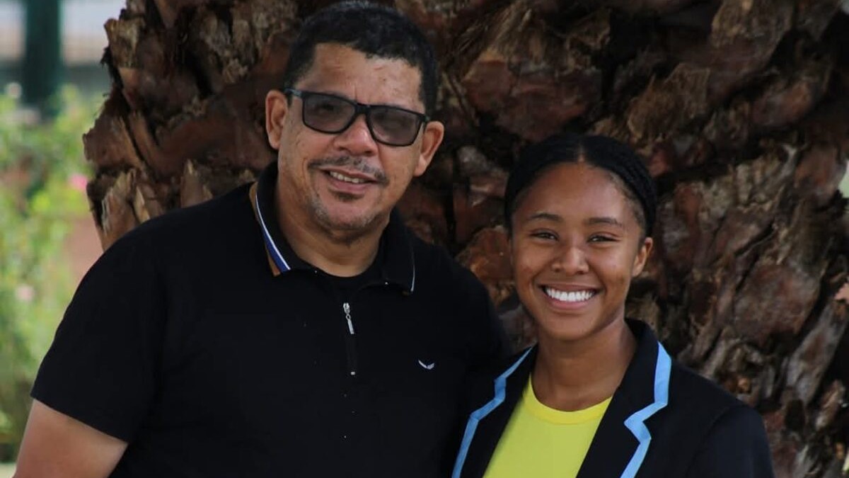 Deputy Principal and athletics coordinator, Gary Hendricks with Annestaysha George, who matriculated in 2022 and received an honorary blazer for achieving Provincial colours in athletics.