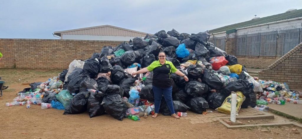 René van Zyl (Project Co-ordinator) in front of the trash that was collected on the day.