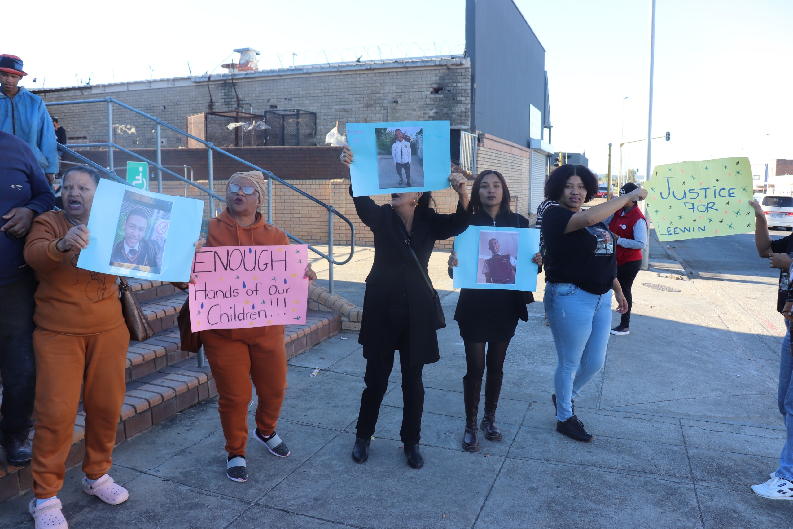 Family of Leewin Solomon chanting, 'Justice for Leewin,' today at the Uitenhage Magistrate's Court.