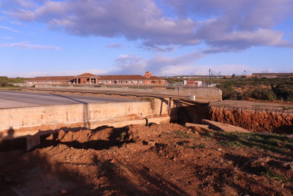 The broken bridge created a barrier between the community and essential healthcare. (BEFORE)