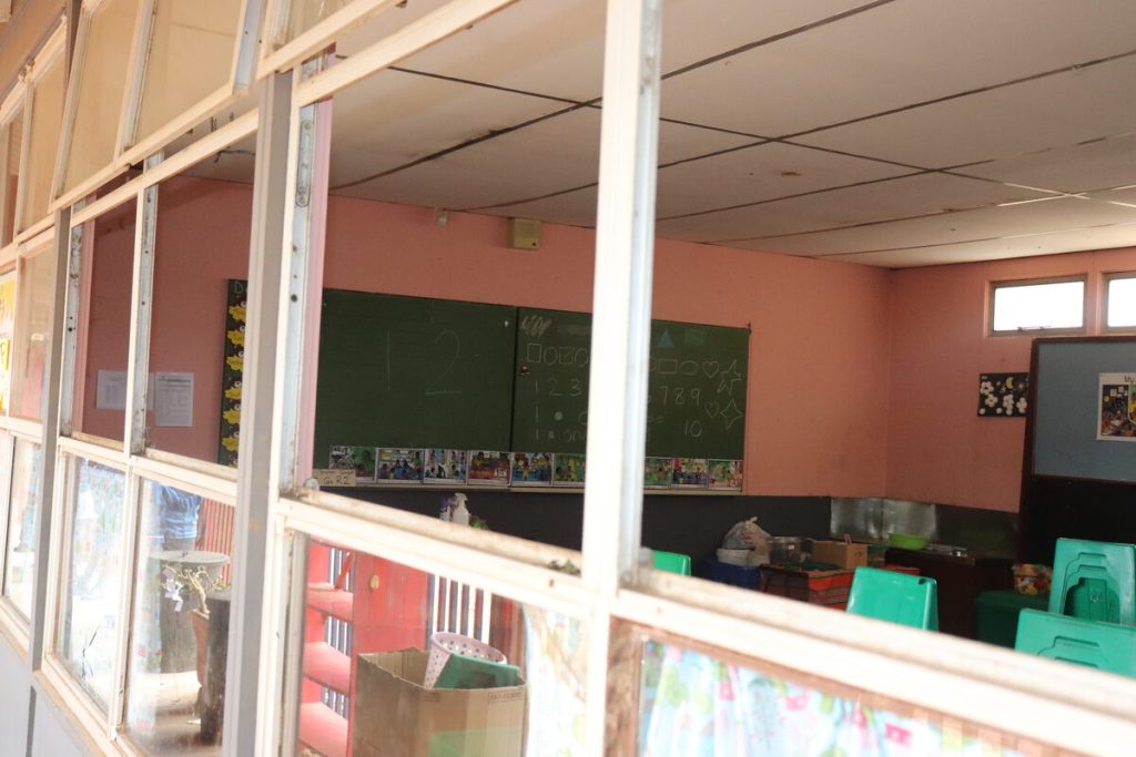 One of the classrooms in which the glass has been removed from the window.