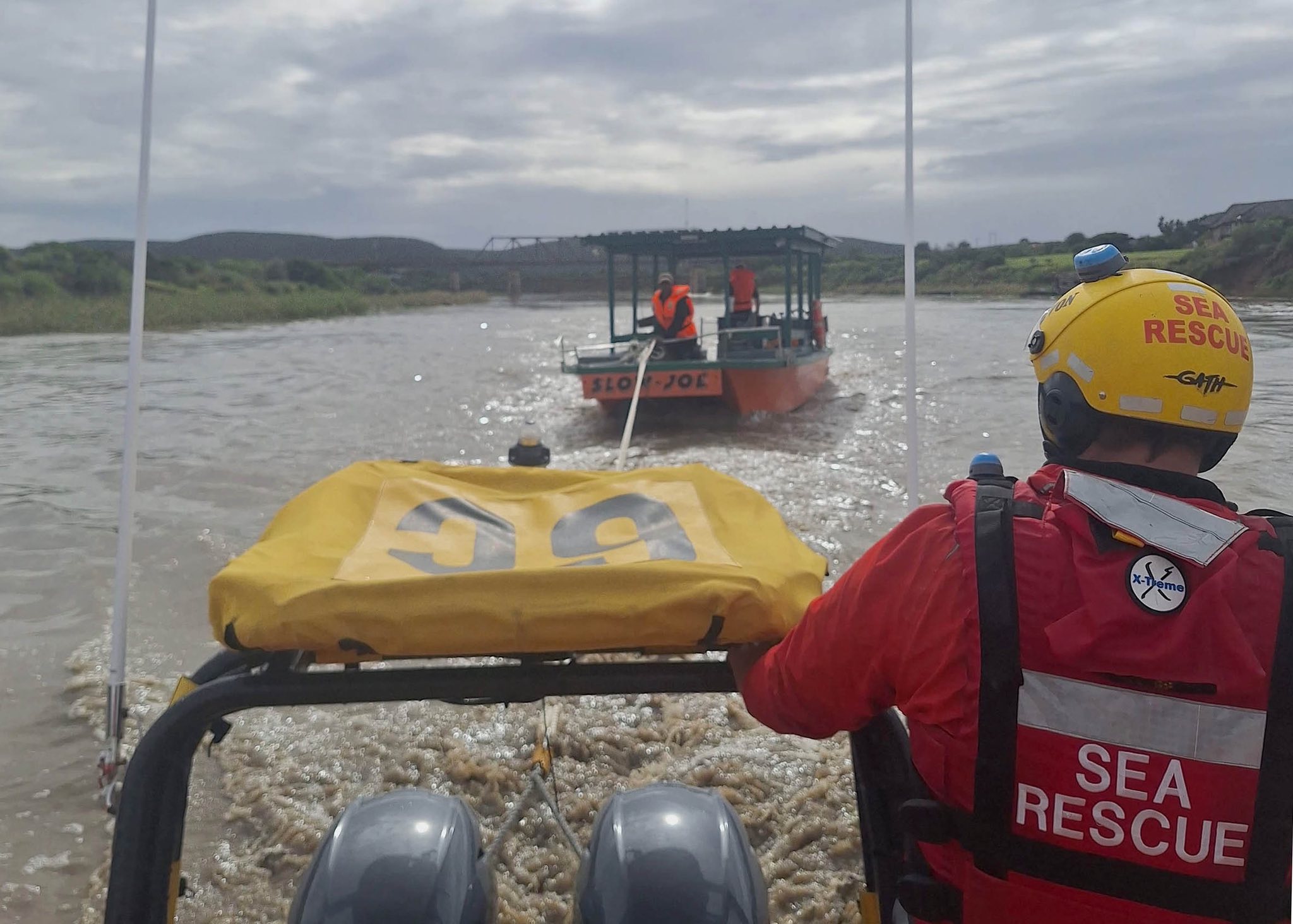 Rescuers stretched across multiple emergencies as floodwaters rose and storm seas battered the Eastern Cape coast.