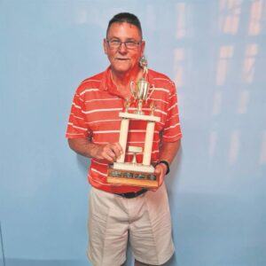 Wins trophy for top golf