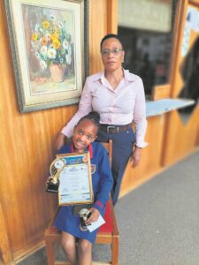 Young speller claims prize