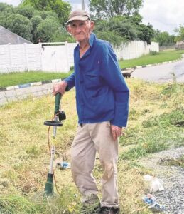 Weathered hands take up task
