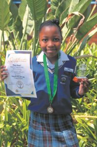 Shows her spelling skills