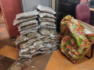 Man spooked by roadblock found with floral bag full of grass