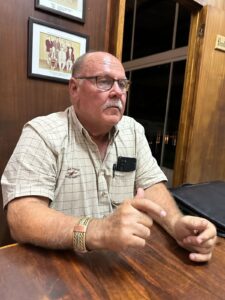 League elects new head to help former police