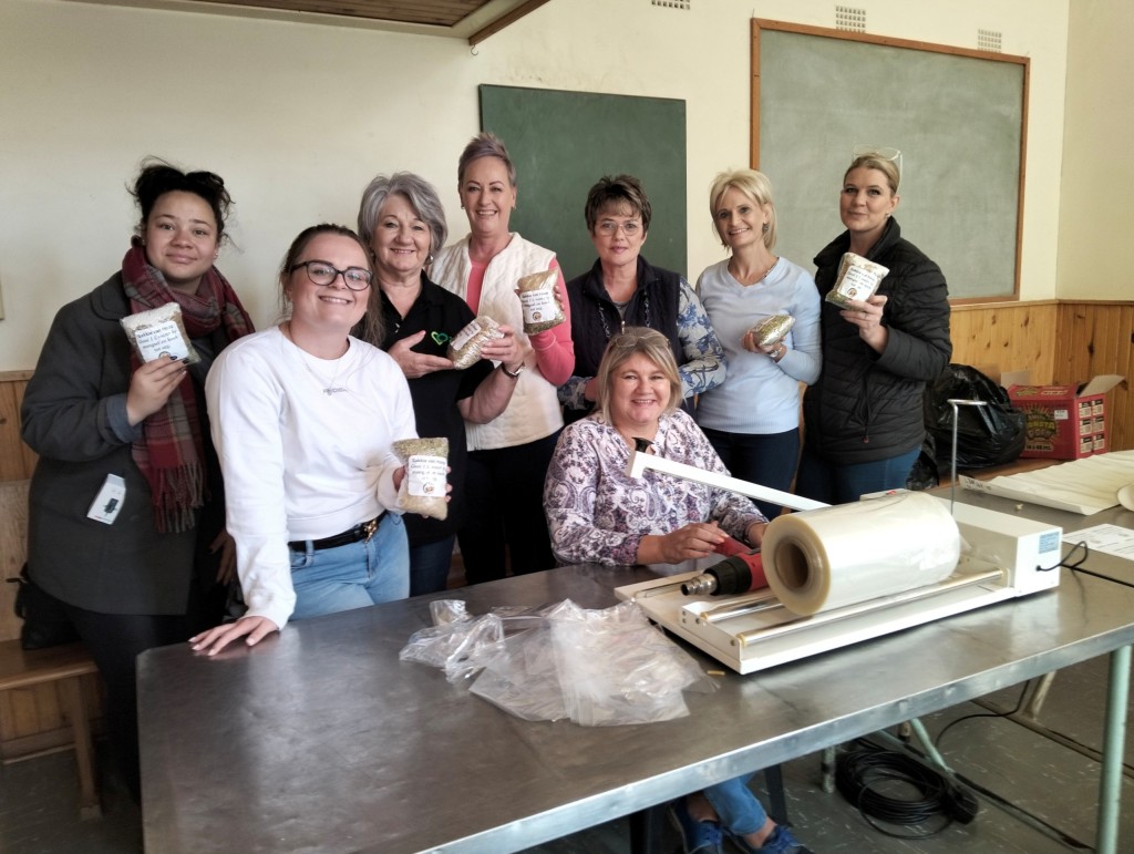 Pictured during the first packing Packets of Hope, that was held at the NG Kerk Welkom Suid, from the left is Karmini Visser (Gold FM), Jessica Santos (Gold FM)< Rina de Jonge (Welkom Suid), Elrina de Beer (Vista), Margaret Crous (Welkom Suid), Amanda-Luoise Nel (Vista), Ilze Labuschagne (Gold FM station manager) and Caria Khatts (Gold FM).