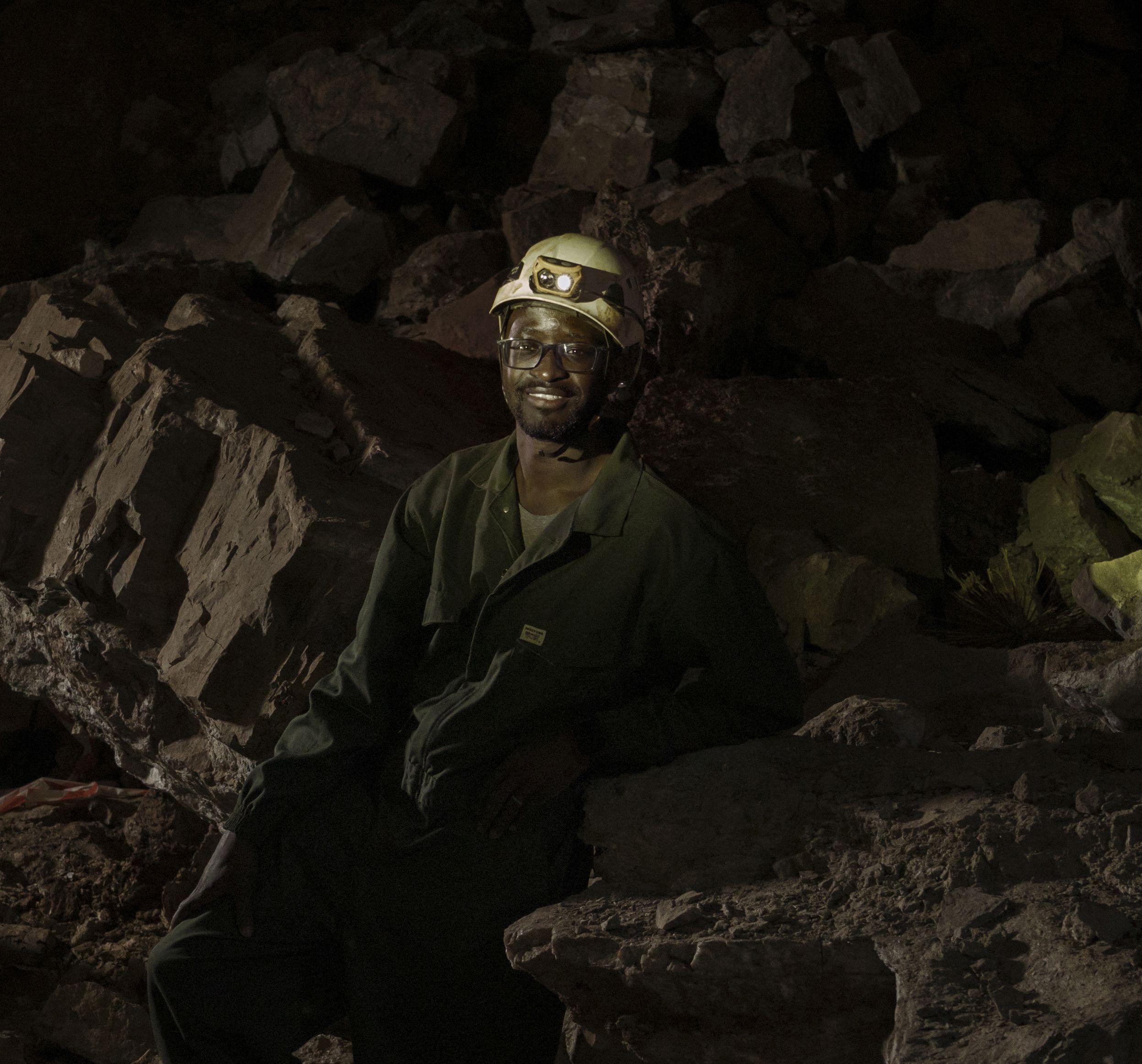 Tebogo Makhubela, a South African geologist recipient of one of the prestigious National Geographic 2025 Wayfinder Awards, poses for a portrait inside the The Rising Star cave, in The Cradle of Humankind area, on June 26, 2025. Makhubela now leads a research team working to uncover ancient clues of human evolution. His turf lies below the surface of the Earth, in the limestone caves of South Africa's Cradle of Humankind, a UNESCO World Heritage Site about 50 kilometres (30 miles) northwest of Johannesburg. (Photo by MARCO LONGARI / AFP)