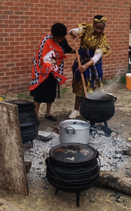 The SAPS in Lejweleputswa District celebrated Heritage Month with multicultural events showcasing diverse cultures, traditional meals, and performances.