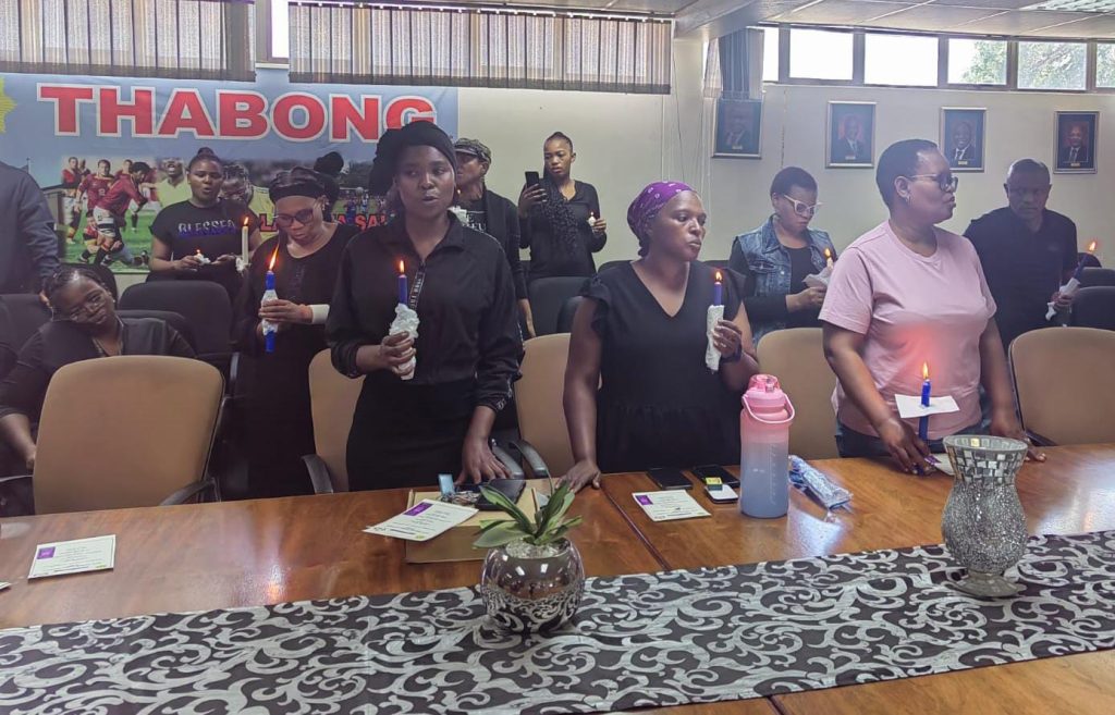 A candlelight vigil and prayer led by Warrant Officer Matsididi