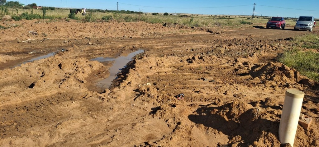 The Phomolong project came to an abrupt halt, leaving roads excavated, stormwater systems incomplete, and residents exposed to severe flooding