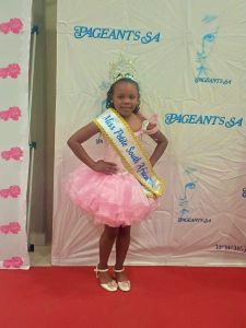 Tiny beauty steals hearts while she notches up more titles