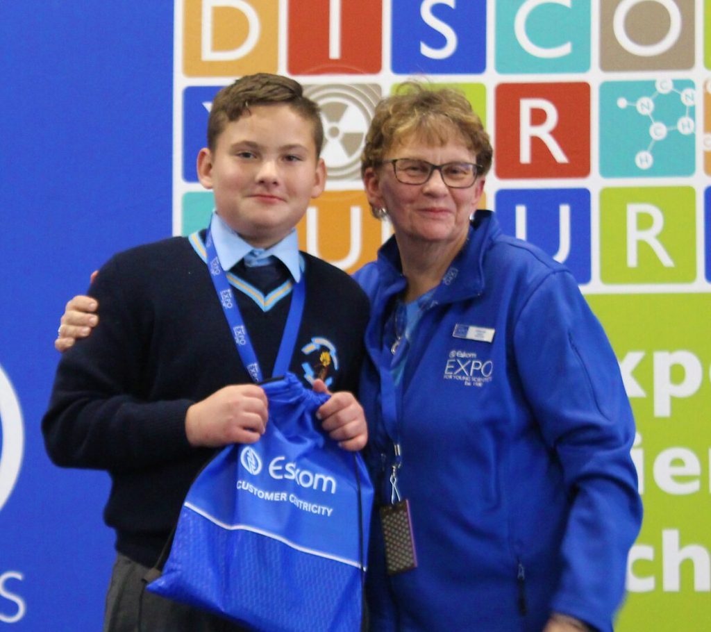 Philip Bryssau from Naudeville Primary School is the Top Junior -. With him is Anina Nel (Welkom Regional Science Fair Director).