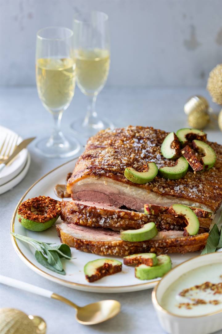 Crispy pork belly roast with avocado.