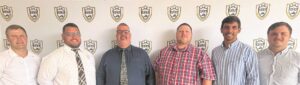 Staan gereed om leiding by Griffons te neem met skolespanne